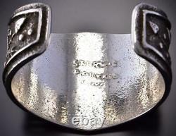 All Silver Many Arrows Navajo Tufacast Bracelet by Delbert Arviso 1B08R