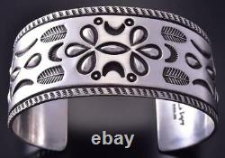 All Silver Navajo Four Feathers Men's Stamped Bracelet by Erick Begay ZC27H