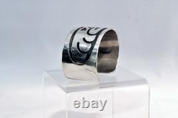 An Early Hopi Bracelet, Sterling Silver Overlay Sikyátki Bird- Dance Wand motif An Early Hopi Bracelet, Sterling Silver Overlay Sikyátki Bird- Dance Wand motif