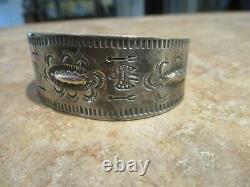 EARLY 1900's NAVAJO Coin / Sterling Silver STAMPED DESIGN Bracelet with Logs