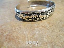 EARLY! TOMMY SINGER (d.) Navajo Sterling HORSES / BUFFALO / BUTTES Bracelet