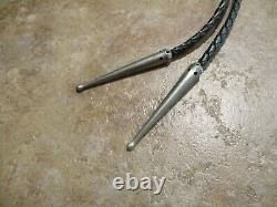 EARLY TOMMY SINGER (d.) Navajo Sterling Silver WOLF STORYTELLER Bolo Tie