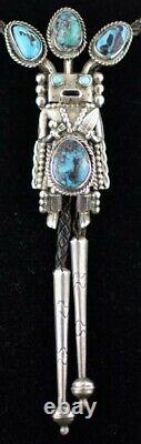Early 70s Navajo Wrought Silver and Turquoise Yei Kachina Bolo Tie by Helen Long
