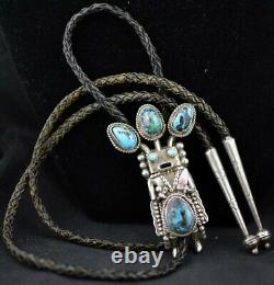Early 70s Navajo Wrought Silver and Turquoise Yei Kachina Bolo Tie by Helen Long