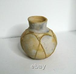 Early Rustic Indian Wood Fired Clay Vase with natural skin wrap Native American