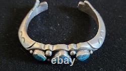 Early Sandcast Turquoise Cuff Bracelet With Healing Hand Terminals 60.7 Grams