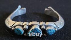 Early Sandcast Turquoise Cuff Bracelet With Healing Hand Terminals 60.7 Grams