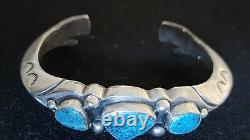 Early Sandcast Turquoise Cuff Bracelet With Healing Hand Terminals 60.7 Grams