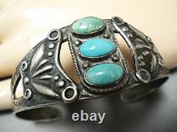 Early Vintage Navajo Turquoise Repoussed Sterling Silver Bracelet