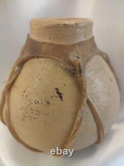 Early rustic fired clay vase with natural skin Tarahumara water jug