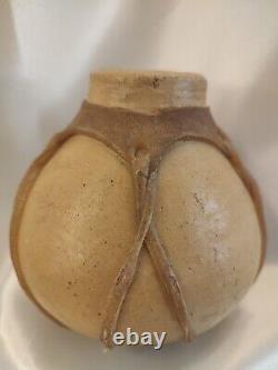 Early rustic fired clay vase with natural skin Tarahumara water jug