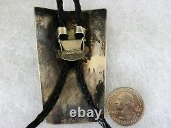 Early, signed, chip inlay Kachina Bolo Tie 3-1/8