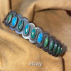Exquisite Early Silver Row Bracelet, Fifteen Smooth Bezel Turquoise Cabochons