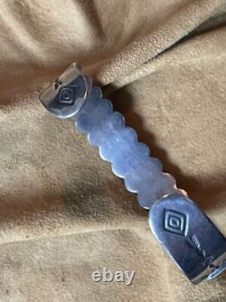 Exquisite Early Silver Row Bracelet, Fifteen Smooth Bezel Turquoise Cabochons Exquisite Early Silver Row Bracelet, Fifteen Smooth Bezel Turquoise Cabochons