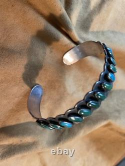 Exquisite Early Silver Row Bracelet, Fifteen Smooth Bezel Turquoise Cabochons