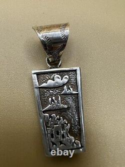 Native American inlaid reversible Sterling pendant carved One Side Inlaid Other