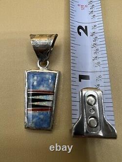 Native American inlaid reversible Sterling pendant carved One Side Inlaid Other