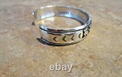 SPECIAL EARLY TOMMY SINGER (d.) Navajo Sterling NINE BUFFALO Design Bracelet