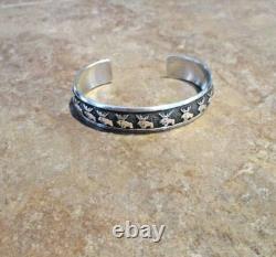 SPECIAL EARLY TOMMY SINGER (d.) Navajo Sterling NINE BUFFALO Design Bracelet