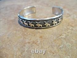 SPECIAL EARLY TOMMY SINGER (d.) Navajo Sterling NINE BUFFALO Design Bracelet