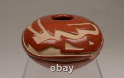Santa Clara Pueblo Caved Red Seed Jar by Denise Chavarria Early 21st Century