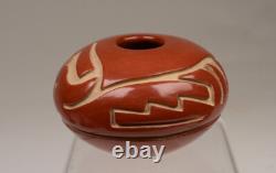Santa Clara Pueblo Caved Red Seed Jar by Denise Chavarria Early 21st Century