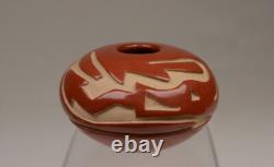 Santa Clara Pueblo Caved Red Seed Jar by Denise Chavarria Early 21st Century