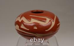 Santa Clara Pueblo Caved Red Seed Jar by Denise Chavarria Early 21st Century