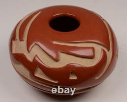 Santa Clara Pueblo Caved Red Seed Jar by Denise Chavarria Early 21st Century