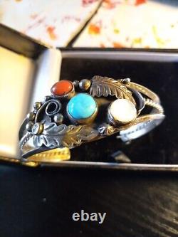 Vintage Silver Navajo Bracelet With A Turquoise Stone And 2 Other Unknown Stones