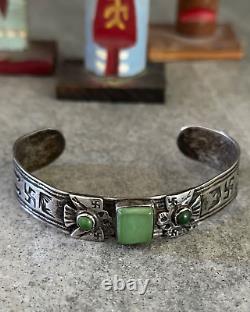 ANCIEN BRACELET EN ARGENT STERLING NAVAHO TURQUOISE AVEC LOGO TOURBILLON ET OISEAU DU TONNERRE DES ANNÉES 1920