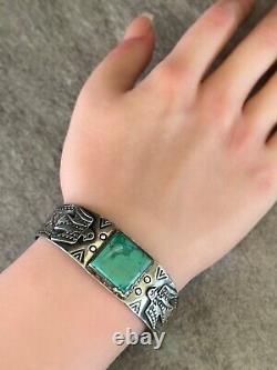 Ancienne époque de Fred Harvey: Bracelet en argent sterling et turquoise Navajo Thunderbird