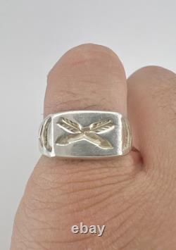 Bague en argent sterling Navajo estampillée et coulée des débuts de l'ère Fred Harvey avec un bouclier en flèche