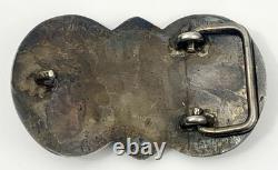 Boucle de ceinture en argent sterling Navajo vintage précoce, faite à la main, avec turquoise en sertissage.