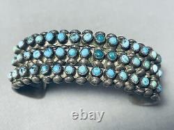 Bracelet en argent sterling et turquoise des années 1930 avec des yeux de serpent Zuni vintage optimal