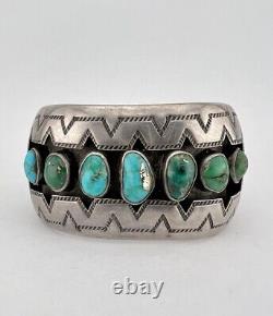 Bracelet manchette en argent de monnaie Navajo de Fred Harvey avec turquoise de Cerrillos en boîte à ombres de Fred Harvey Navajo.