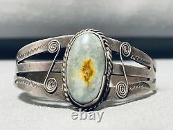 Bracelet manchette en argent sterling Navajo vintage avec pierre en spirale de Swirl
