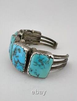 Bracelet manchette en argent sterling navajo des années 1950 avec 7 pierres de turquoise de Morenci - 72g