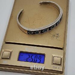 Bracelet rigide à motif de patte d'ours incrustée de turquoise en argent sterling de collection précoce