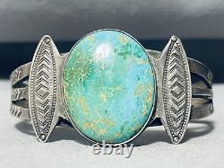 Bracelet vintage Navajo en argent sterling et turquoise à motif de flare vertical précoce