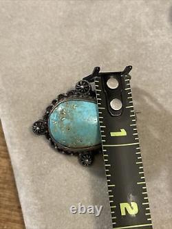 Broche amérindienne en argent sterling antique du début des années 1900 avec une grande pierre de turquoise.