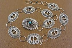 Ceinture en concho Navajo TOMMY SINGER signée tôt avec boucle en argent sterling Thomas