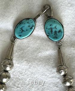 Collier ancien de TOMMY SINGER avec pendentif en turquoise et perles signature en argent sterling