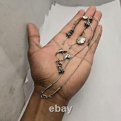 Collier vintage en argent sterling Zuni avec des créatures marines de l'océan fascinantes