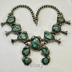 Collier vintage en turquoise et argent sterling de Navajo indien des débuts avec fleurs de courge