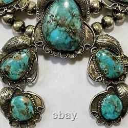 Collier vintage en turquoise et argent sterling de Navajo indien des débuts avec fleurs de courge