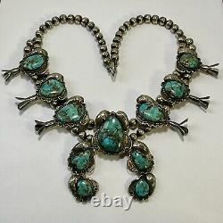 Collier vintage en turquoise et argent sterling de Navajo indien des débuts avec fleurs de courge