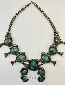 Collier vintage en turquoise et argent sterling de Navajo indien des débuts avec fleurs de courge