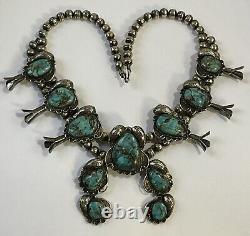 Collier vintage en turquoise et argent sterling de Navajo indien des débuts avec fleurs de courge