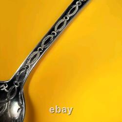 Cuillère-souvenir en argent de pièce/ignot Navajo ancienne de 1900 avec visage amérindien
